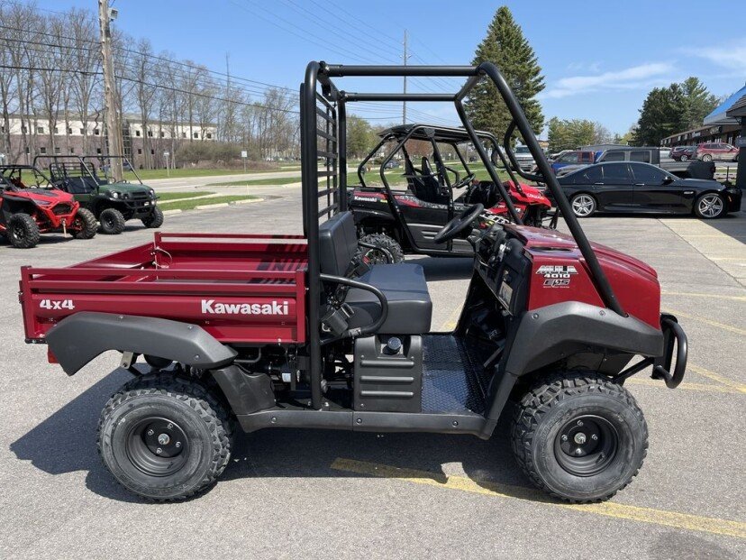 2023 Kawasaki Mule™ 4010 4×4 MEET THE NO-NONSENSE, MID-SIZE POWERHOUSE You dont quit during a hard days work, and neither does the Kawasaki MULE™ 4000 and MULE™ 4010 4×4 side x sides. These mid-size, high capacity, two-passenger vehicles have the muscle and endurance for a full days work, plus the towing and cargo capacity to take the heavy load off your shoulders. Features include: POWER GET THE JOB DONE MULE™ 4000 and MULE™ 4010 side x sides deliver muscle with a dependable, fuel-injected 617cc V-twin engine. The smooth-running liquid-cooled four-stroke starts easily whether it’s hot or cold and provides steady torque for smooth, responsive power when you need it. DRIVETRAIN KEEP UP THE POWER Automatic Continuously Variable Transmission (CVT) puts the power to the ground. MULE™ 4010 side x sides are available in 2WD or selectable 4WD and feature a dual-mode rear differential for added traction when needed. CHASSIS STRONG FOUNDATION Steel tube ladder-type frame is the sturdy foundation of Kawasaki MULE™ side x sides. Optimized rigidity contributes to traction, stability and ride comfort while the Roll Over Protective Structure (ROPS) and steel front bumper provide a rugged external structure. CAPABILITY TAKE A LOAD OFF Independent MacPherson strut-type front suspension and DeDion rear suspension provide a firm and predictable platform that is ideal for a work-oriented side x side. Tow up to 1,200 lbs. and carry up to 800 lbs. in the cargo bed. Electric Power Steering (EPS) 2023 Kawasaki Mule™ 4010 4×4 MEET THE NO-NONSENSE, MID-SIZE POWERHOUSE You dont quit during a hard days work, and neither does the Kawasaki MULE™ 4000 and MULE™ 4010 4×4 side x sides. These mid-size, high capacity, two-passenger vehicles have the muscle and endurance for a full days work, plus the towing and cargo capacity to take the heavy load off your shoulders. Features include: POWER GET THE JOB DONE MULE™ 4000 and MULE™ 4010 side x sides deliver muscle with a dependable, fuel-injected 617cc V-twin engine. The smooth-running liquid-cooled four-stroke starts easily whether it’s hot or cold and provides steady torque for smooth, responsive power when you need it. DRIVETRAIN KEEP UP THE POWER Automatic Continuously Variable Transmission (CVT) puts the power to the ground. MULE™ 4010 side x sides are available in 2WD or selectable 4WD and feature a dual-mode rear differential for added traction when needed. CHASSIS STRONG FOUNDATION Steel tube ladder-type frame is the sturdy foundation of Kawasaki MULE™ side x sides. Optimized rigidity contributes to traction, stability and ride comfort while the Roll Over Protective Structure (ROPS) and steel front bumper provide a rugged external structure. CAPABILITY TAKE A LOAD OFF Independent MacPherson strut-type front suspension and DeDion rear suspension provide a firm and predictable platform that is ideal for a work-oriented side x side. Tow up to 1,200 lbs. and carry up to 800 lbs. in the cargo bed. Electric Power Steering (EPS)